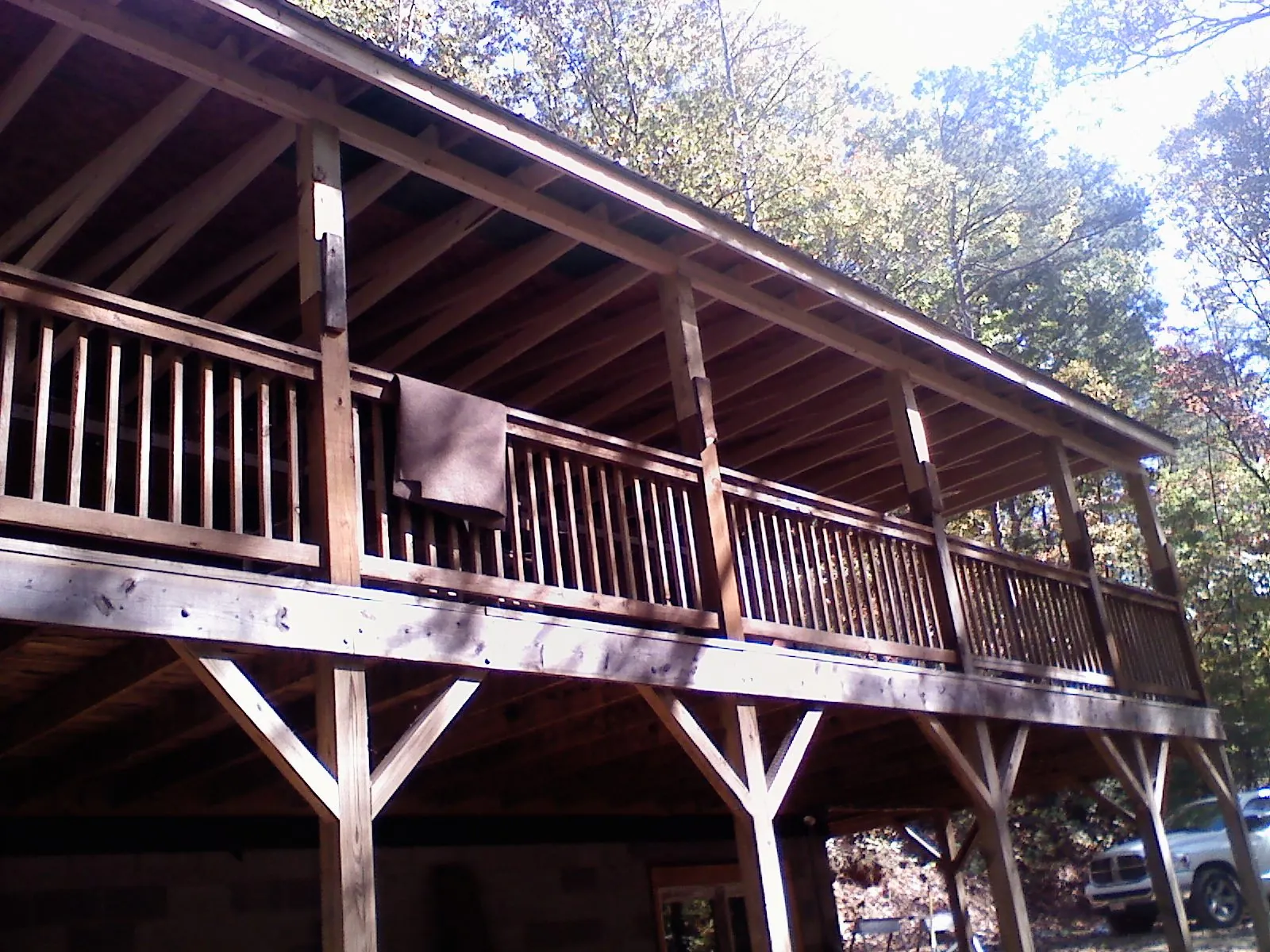 Timber framing under a new elevated porch and deck — Roof Leak Repair in Ozone Park by Roofing Brothers